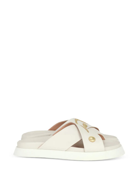  Moschino Cross Strap Logo Sandals - Neutrals 